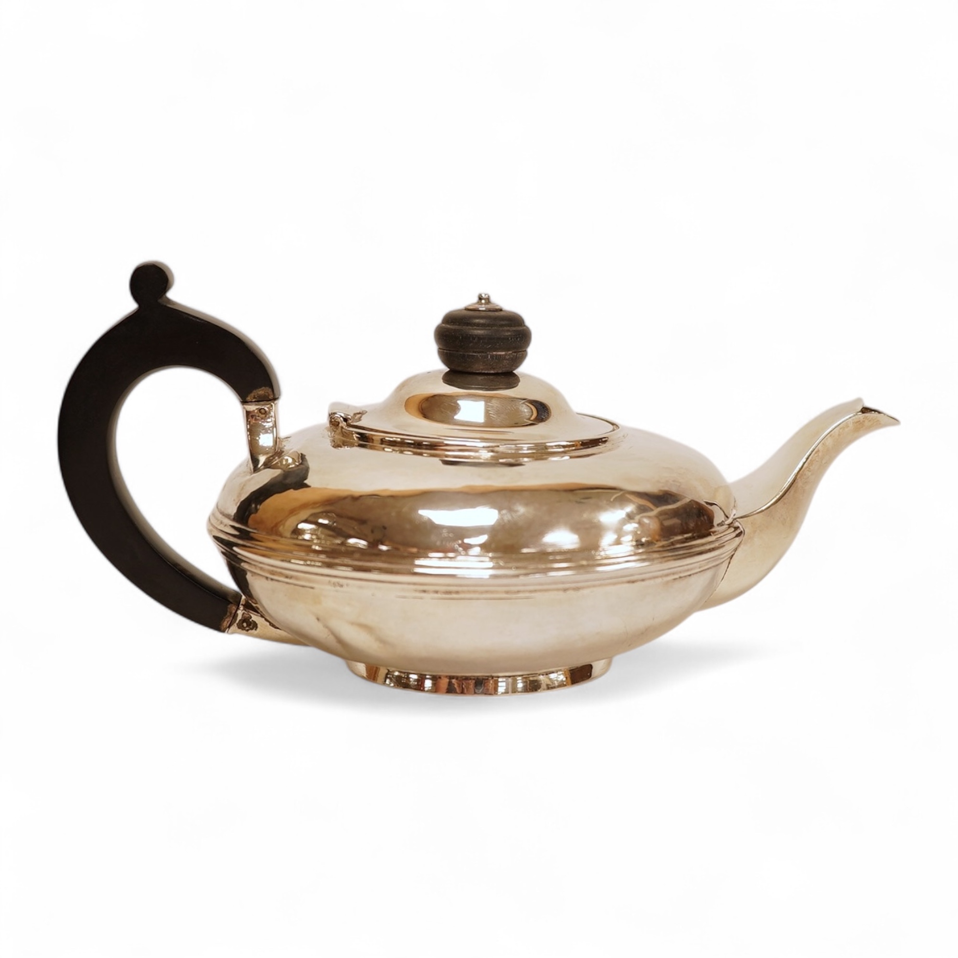 A Victorian squat circular silver teapot, by The Barnards, London, 1846, gross weight 10oz (dents).
